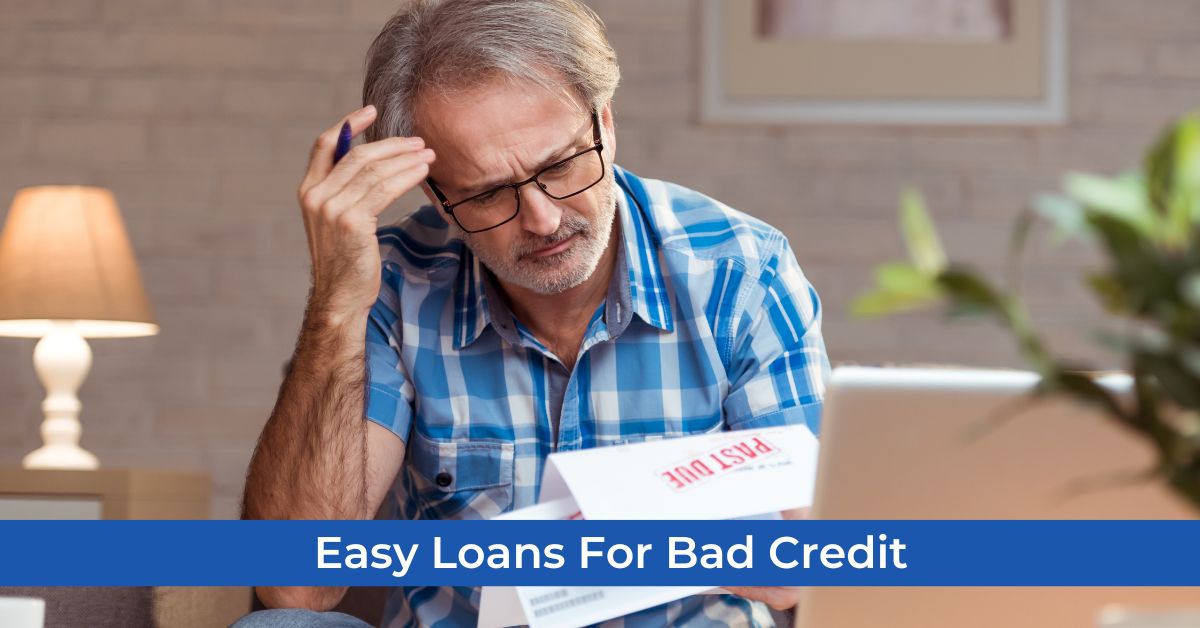 A man holding a document and a pen relating himself to the bad credit he had yet still positive to have and acquire one of the easy loans regardless of the situation.