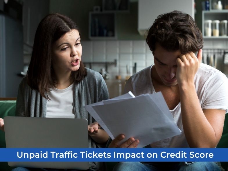 A man and woman who looks like they are encountering a huge problem with unpaid traffic tickets. They look problematic about it as it may impact their credit score.